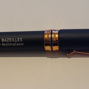 Stylo noir et cuivre avec stylet et lampe